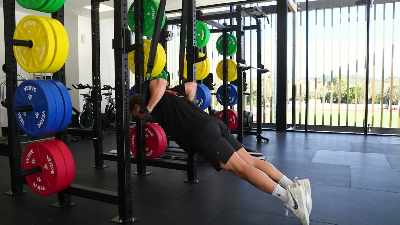 Athlete training explosive work in a VERVE rig.