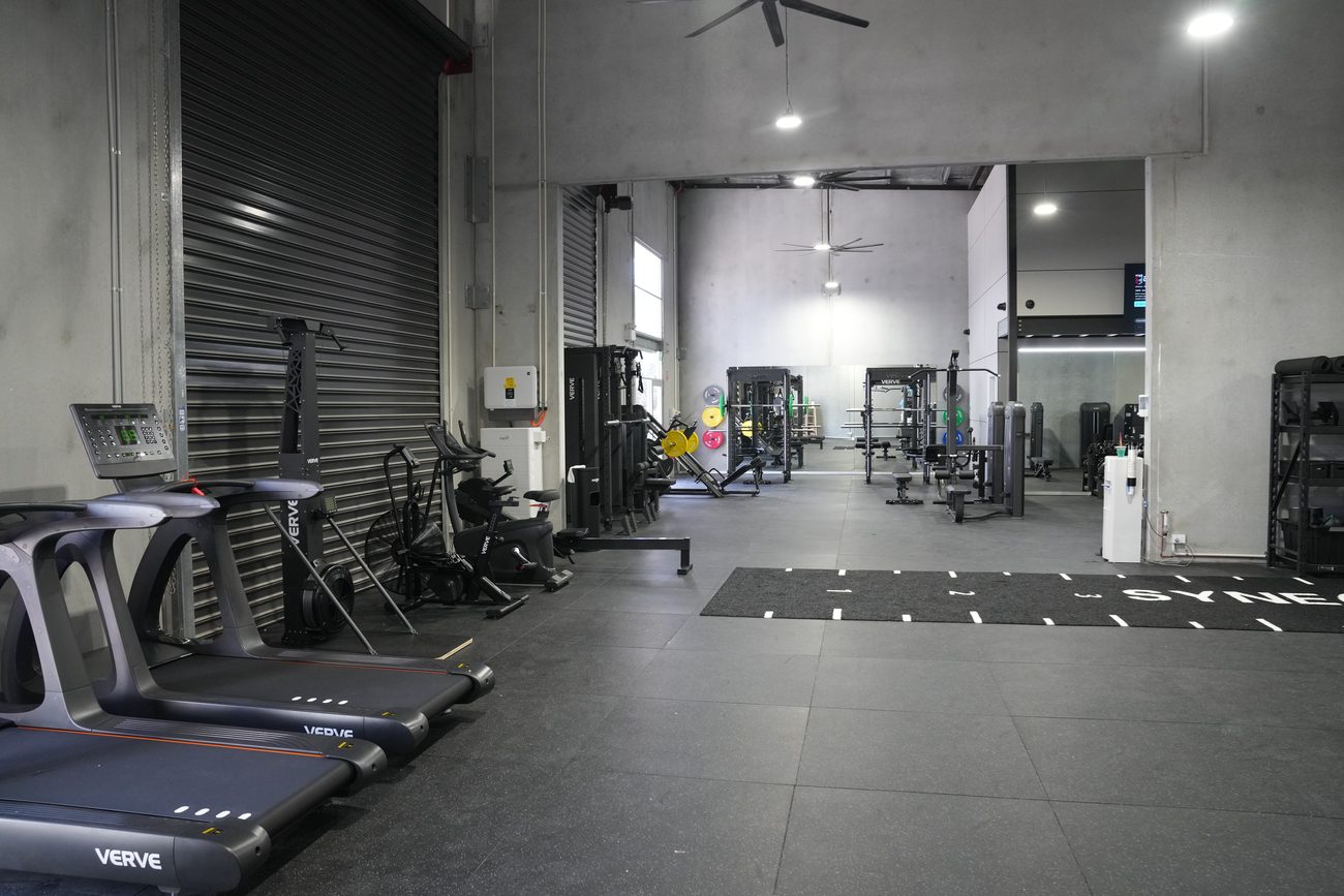 VERVE treadmills and the turf zone at the Synergy RX entrance.